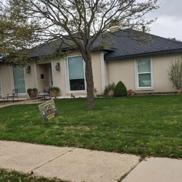 Premium residential roofing project with dark charcoal shingles