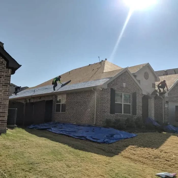Roof repair after storm damage showing hail and wind damage assessment