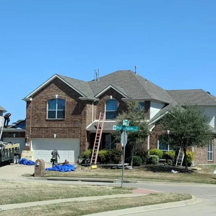 Montesco Roofing team working on a residential project